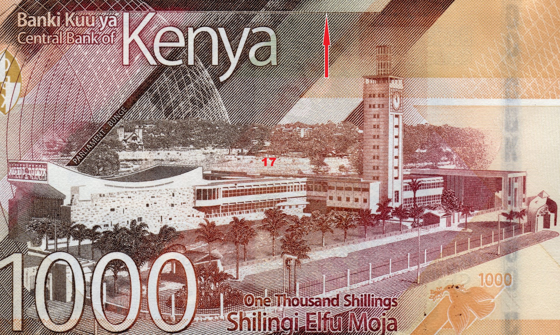 6. 17) Pohled na budovu keňského parlamentu v Nairobi, červená šipka označuje pozici mikropísma.